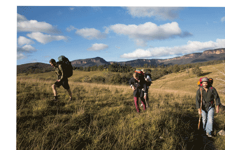 Animated illustration of people hiking in the outdoors Animated illustration of people hiking in the outdoors