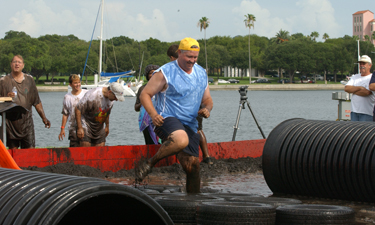 Harmon and other city staff compete against local youth in the St. Petersburg Mud Wars. Harmon and other city staff compete against local youth in the St. Petersburg Mud Wars.