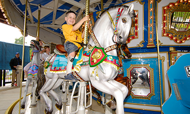 This accessible carousel at Clemyjontri Park in Virginia features chariots and a spinning tea cup that accommodate children in wheelchairs. Photo: Don Sweeney/Fairfax County Park Authority. This accessible carousel at Clemyjontri Park in Virginia features chariots and a spinning tea cup that accommodate children in wheelchairs. Photo: Don Sweeney/Fairfax County Park Authority.