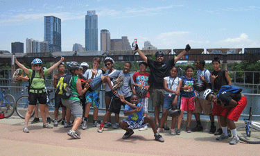 This enthusiastic group of teens is out for a bike ride along Lady Bird Lake’s Hike and Bike Trail, just one activity offered at Camacho Activity Center. This enthusiastic group of teens is out for a bike ride along Lady Bird Lake’s Hike and Bike Trail, just one activity offered at Camacho Activity Center.