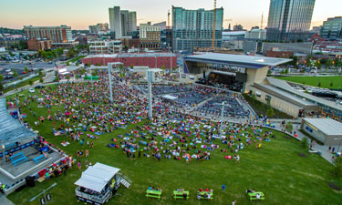 Nashville residents and visitors enjoy the outdoors and performances at the Ascend Amphitheater and on the 1.5-acre event lawn, the Green, in Riverfront Park on the banks of the Cumberland River. Nashville residents and visitors enjoy the outdoors and performances at the Ascend Amphitheater and on the 1.5-acre event lawn, the Green, in Riverfront Park on the banks of the Cumberland River.