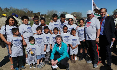 Interior Secretary Sally Jewell (crouching, front) with Anahuak Youth Sports Association members, Raul Macias (second from right), and Robert Garcia (far right) at Los Angeles State Historic Park. Interior Secretary Sally Jewell (crouching, front) with Anahuak Youth Sports Association members, Raul Macias (second from right), and Robert Garcia (far right) at Los Angeles State Historic Park.