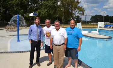Loretto Pool project partners from left to right: Tom Doherty, TDEC; Gerald Parish, TDEC; Commissioner Robert J. Martineau Jr.; and Representative Barry Doss. Loretto Pool project partners from left to right: Tom Doherty, TDEC; Gerald Parish, TDEC; Commissioner Robert J. Martineau Jr.; and Representative Barry Doss.